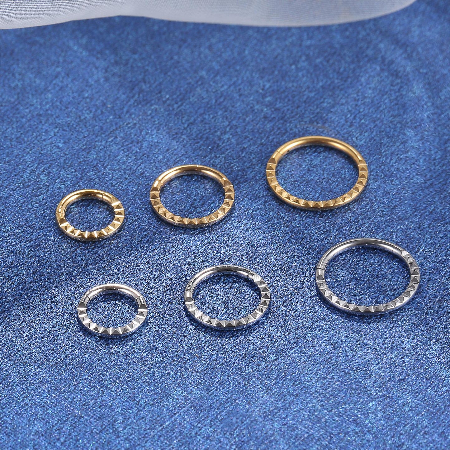 Titanium Pyramid-Cut Carved Ring Hypoallergenic 16G Clicker